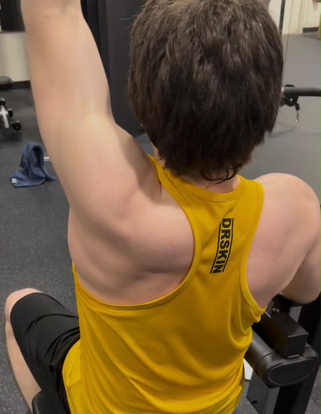 Coaching client photographed from the back: 3 months